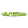 Annie Peridot Green Stretch Bracelet featuring green disc beads and gold accents by Bourbon and Boweties.