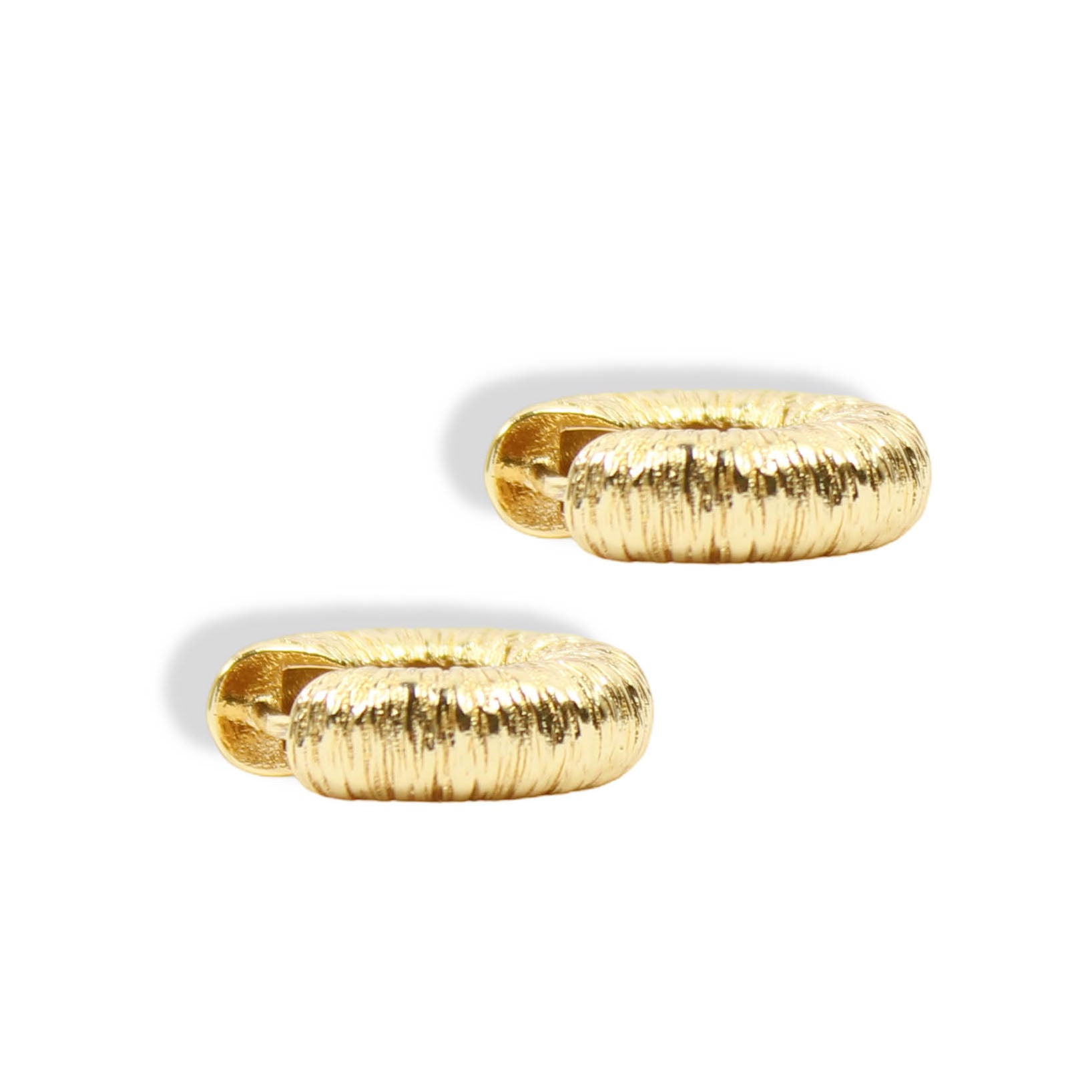 Harper Gold Huggie Earrings featuring chunky gold-tone hoops with a textured, crinkled finish by Bourbon and Boweties.