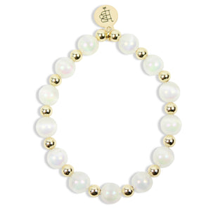 Annie Opal Stretch Bracelet with iridescent white opal-style beads, polished gold spacer beads, and signature gold tag by Bourbon and Boweties