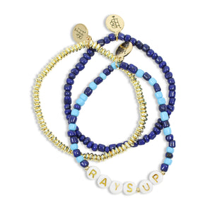 Tampa Bay Rays Up! three-piece stretch bracelet stack featuring blue and gold beads and RAYS UP letter charms by Bourbon and Boweties.
